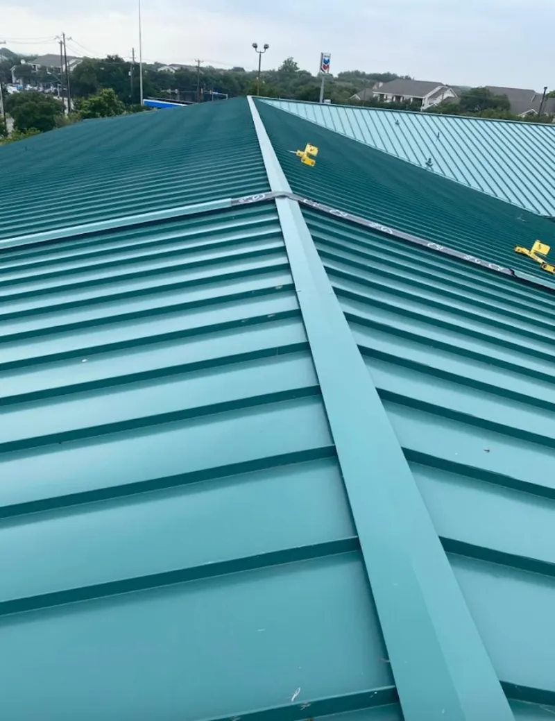 Green commercial metal roof ridge and valley for Metal Roof Repair in Wheaton
